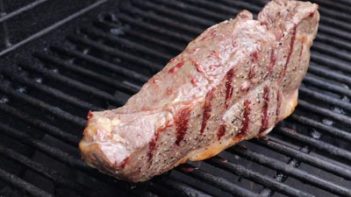 steak cooking on a grill